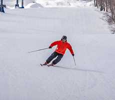Young man skiing at Ski la Reserve