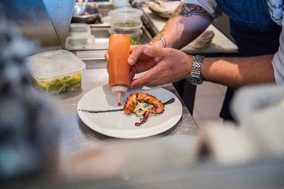 Meal preparation at Bistro Le Coup Monté