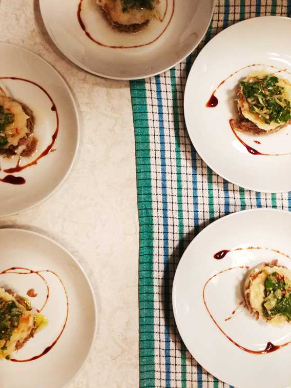 Parmentier of duck confit and parsley salad and radish