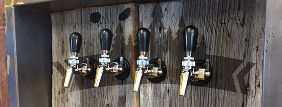Spout of four different beers.