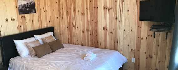 Chambre à coucher des microrefuges chez Plaisirs passion plein air