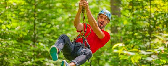 Men doing zip line