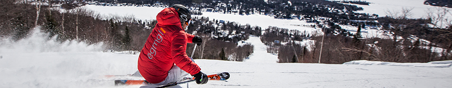 Man downhill skiing at Ski Garceau