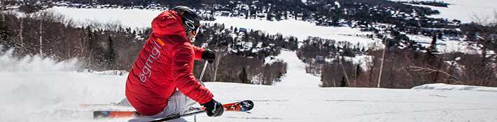 Man downhill skiing at Ski Garceau