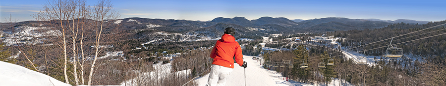 Man on top of Val St-Côme downhill skiing
