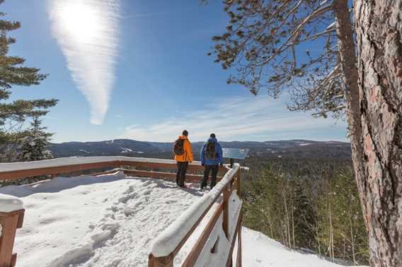 Snowshoeing to the top of belvedere at Saint-Côme