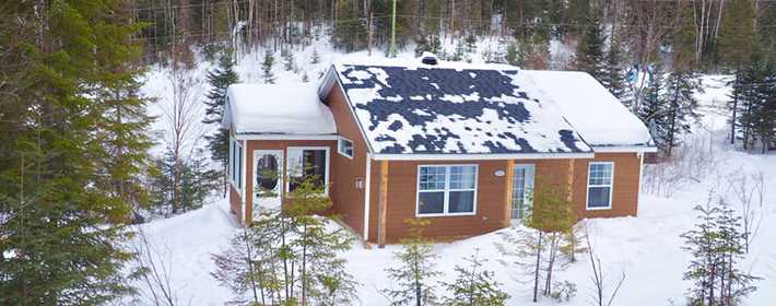Un chalet à Domaine du parc de la forêt ouareau
