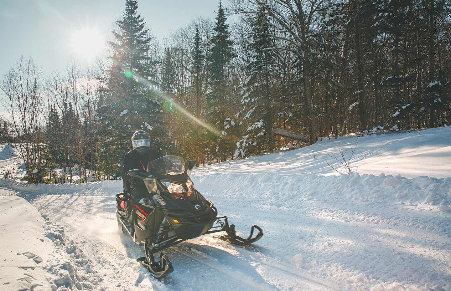 Snowmobile on trail