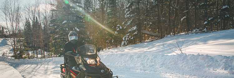 Snowmobile on trail