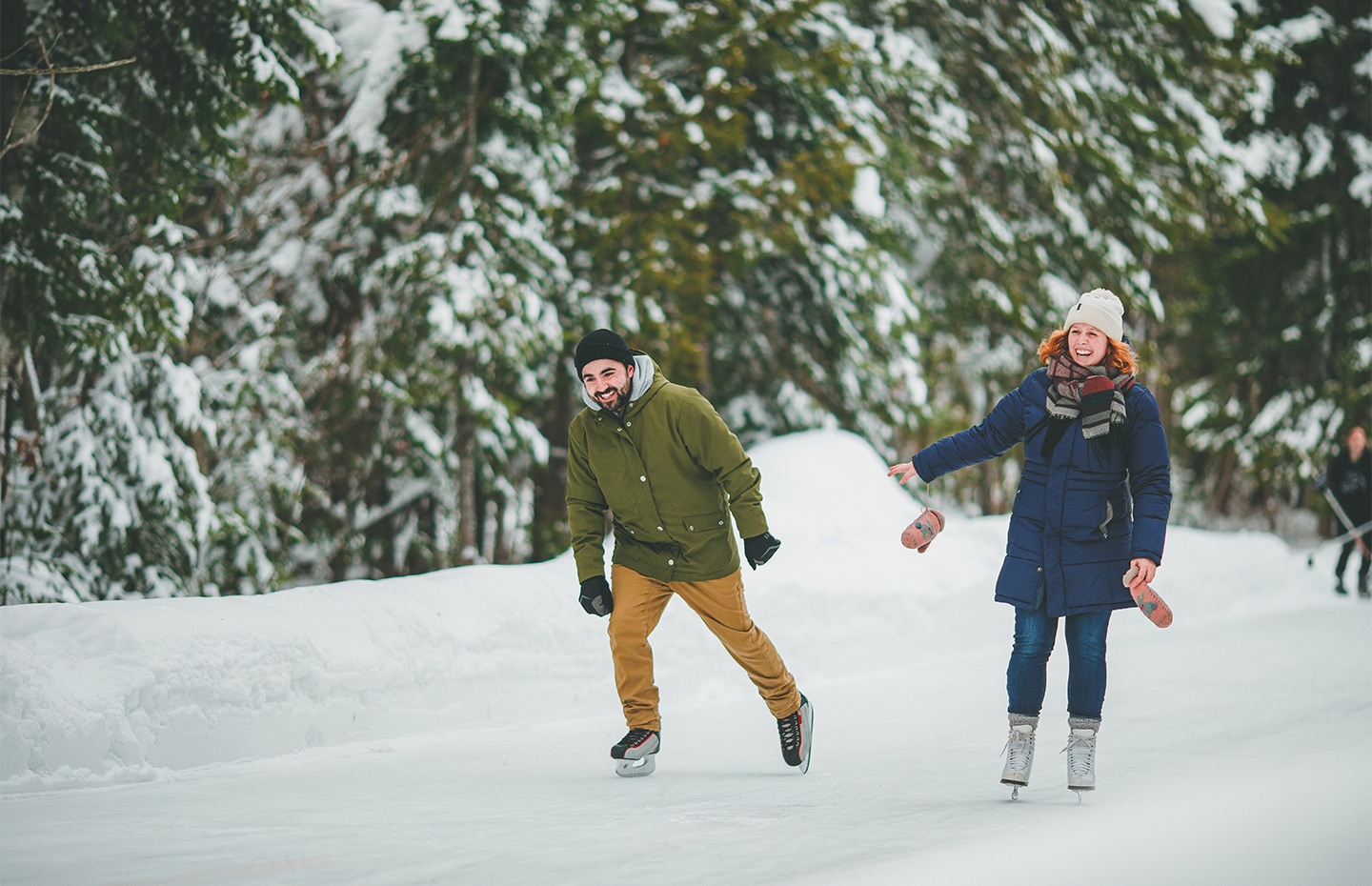Ice skating couple at Parc des Pionniers